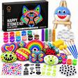Napi Happy Stones Kit Glow Edition met beschilderde stenen, verf, glitterlijm, stickers en een haaiensteen op de mini ezel